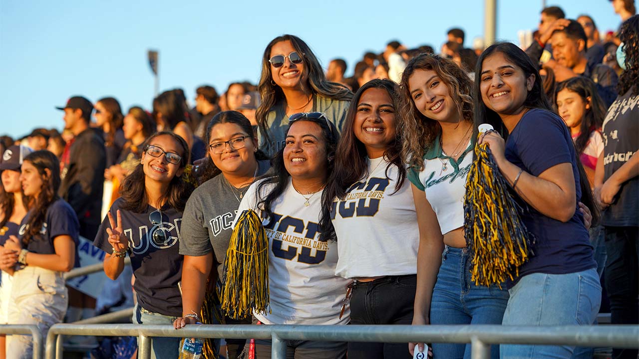 Students in crowd at football game