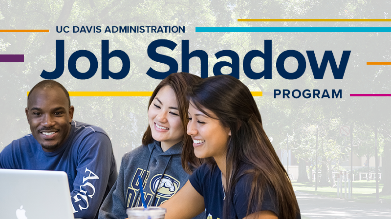 UC Davis students gather around a laptop
