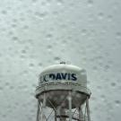 The UC Davis Water Tower in the rain during a heavy rain storm.